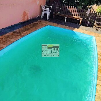 CASA COM PISCINA NO BAIRRO BELA VISTA